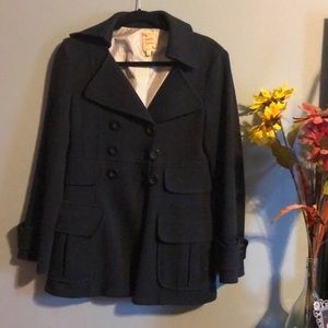 Navy blue lined women’s coat.